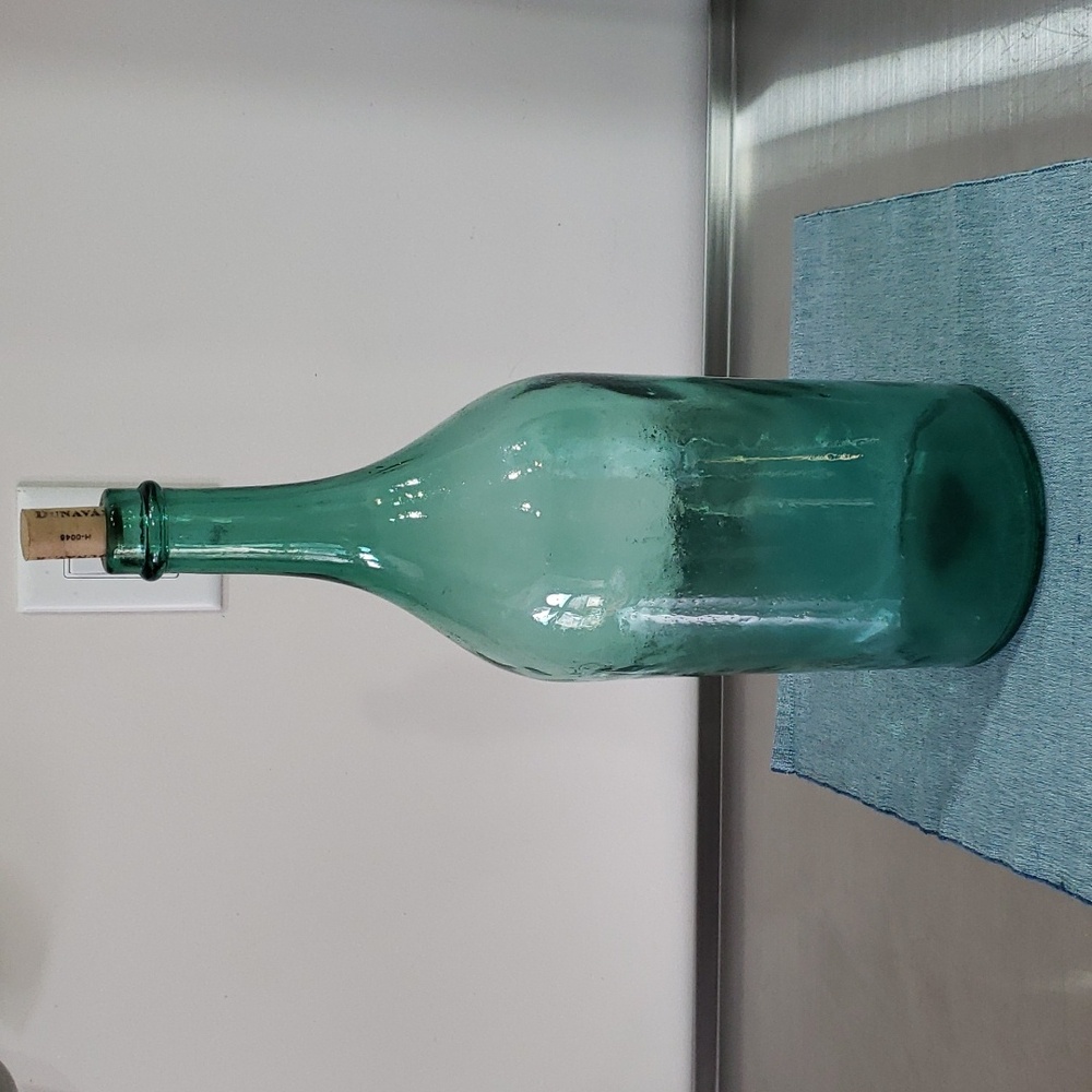 Antique large glass bottle